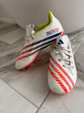 adidas Kids White Soccer Sneakers with Red and Blue Accents